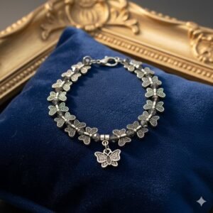 Antique Silver Butterfly Motif Charm Bracelet