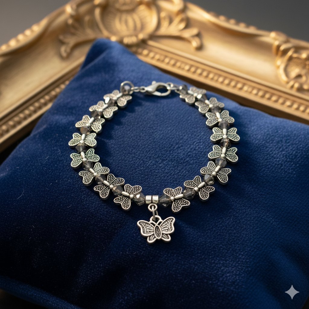 Antique Silver Butterfly Motif Charm Bracelet