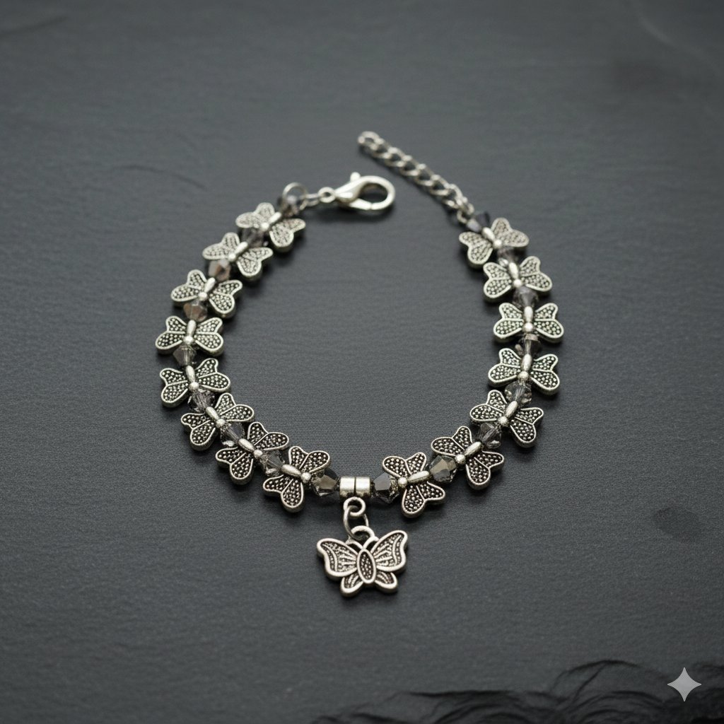 Antique Silver Butterfly Motif Charm Bracelet - Image 2