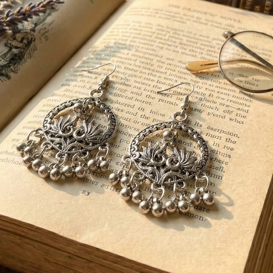 Oxidized Silver Peacock Motif Hoop Earrings with Ghungroo Charms - Image 2