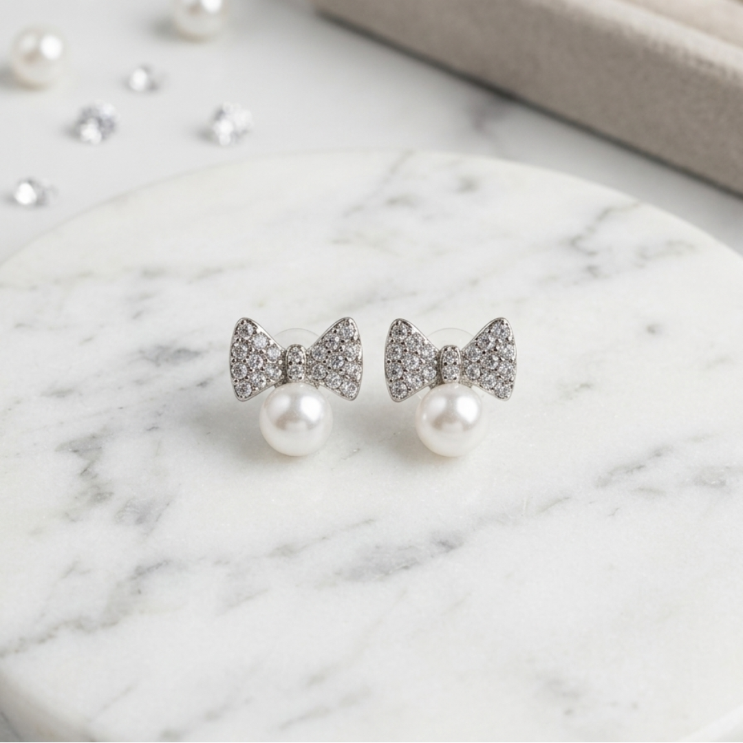 Sparkling Bow Pearl Drop Earrings - Image 3