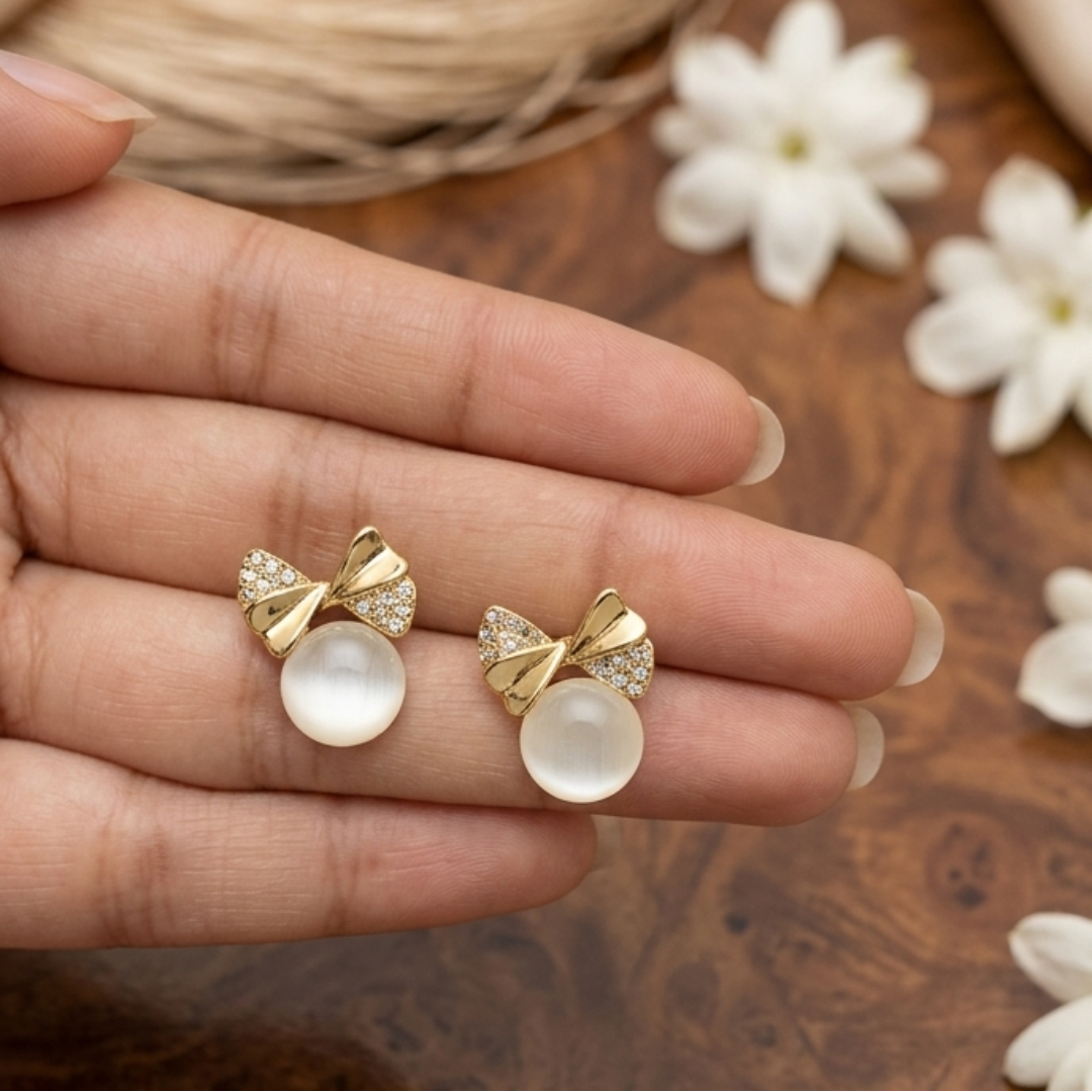 Golden Bow Cat’s Eye Drop Studs - Image 2